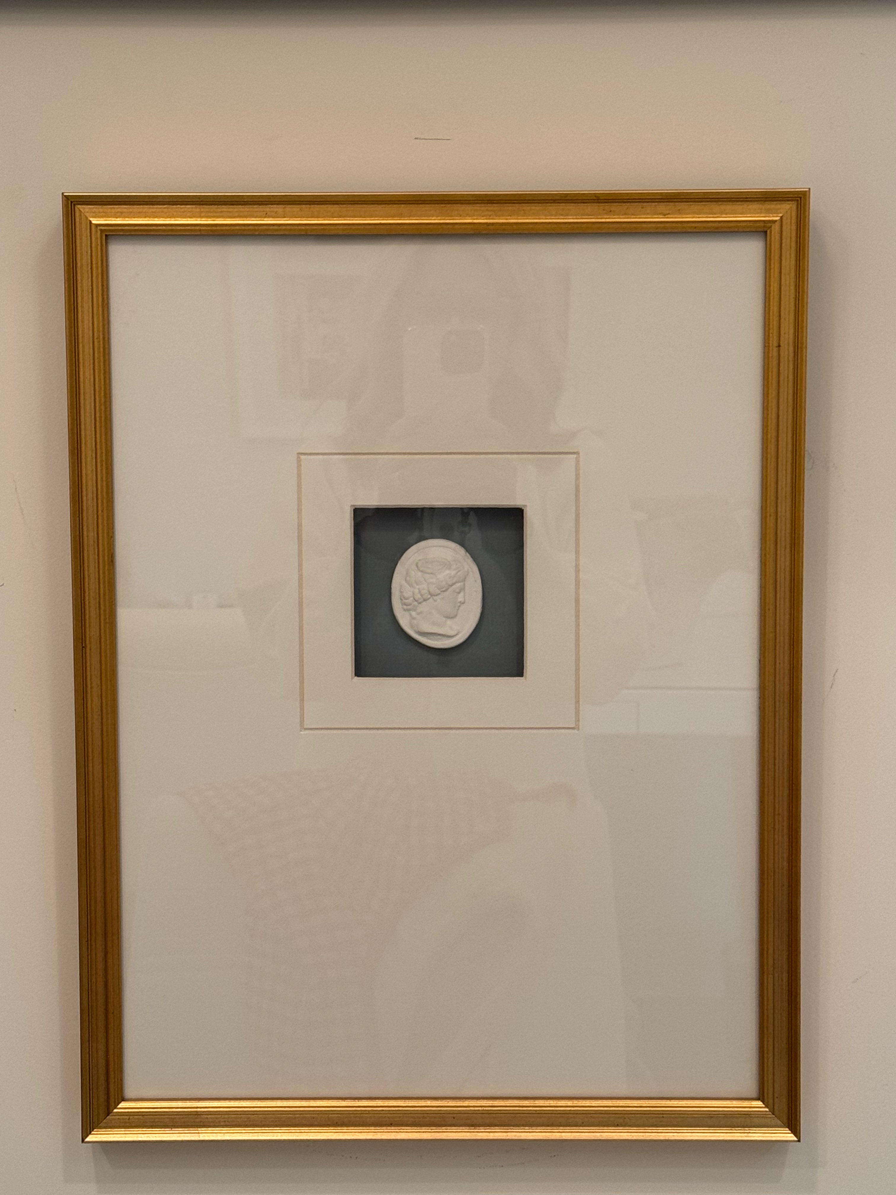 Single Intaglio on Blue Background