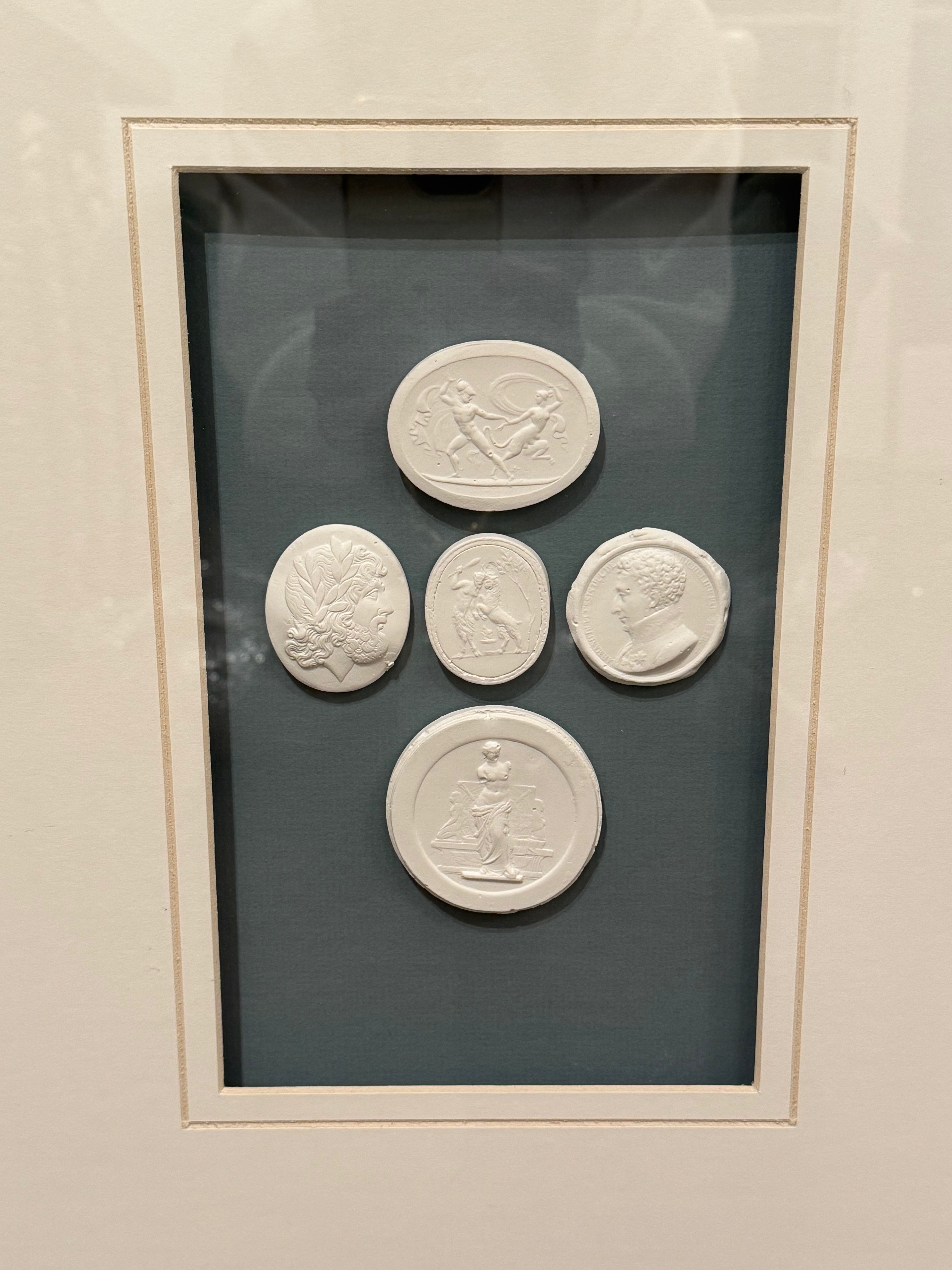 Multiple Intaglios with Blue Background