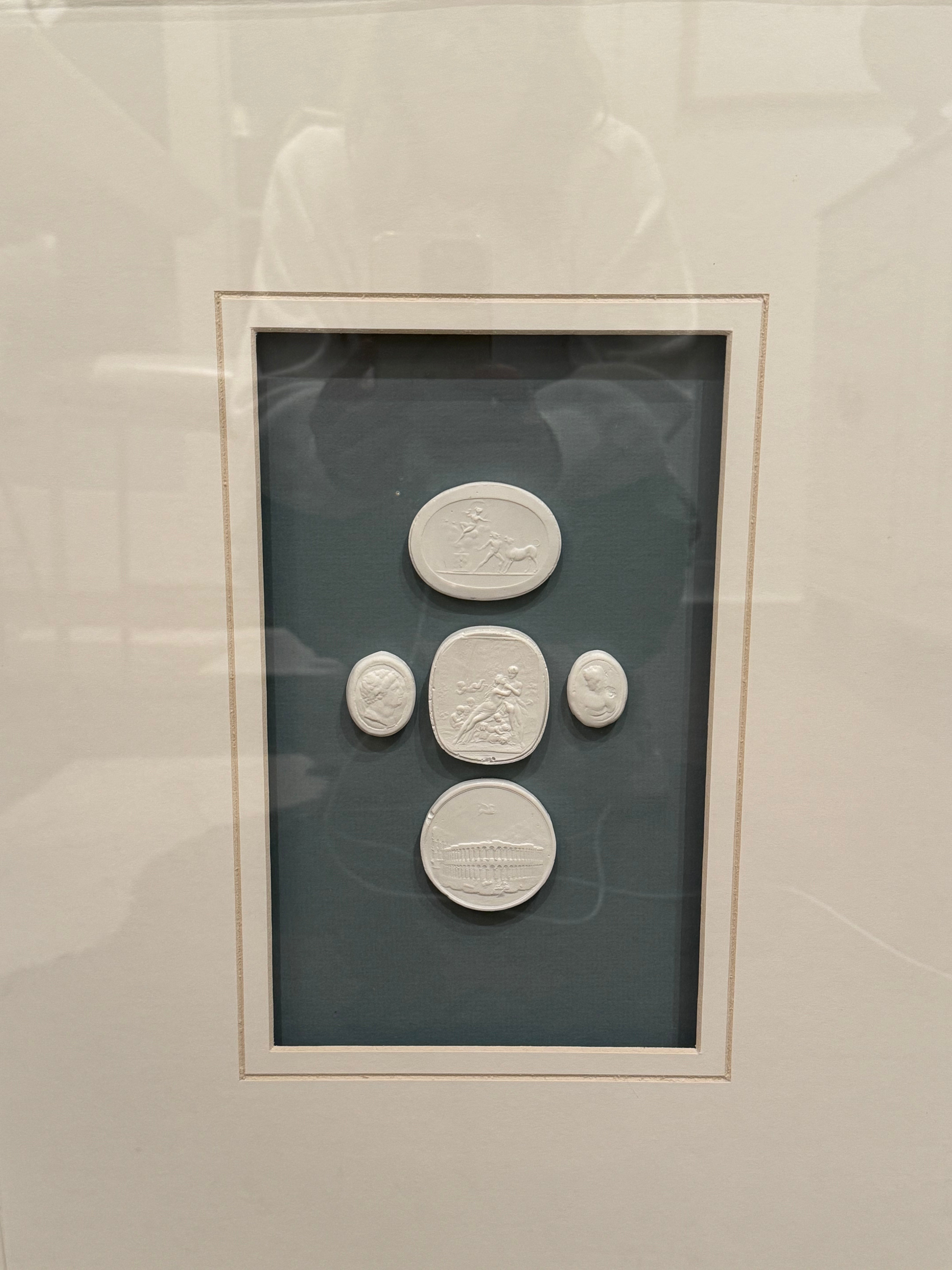 Multiple Intaglios with Blue Background