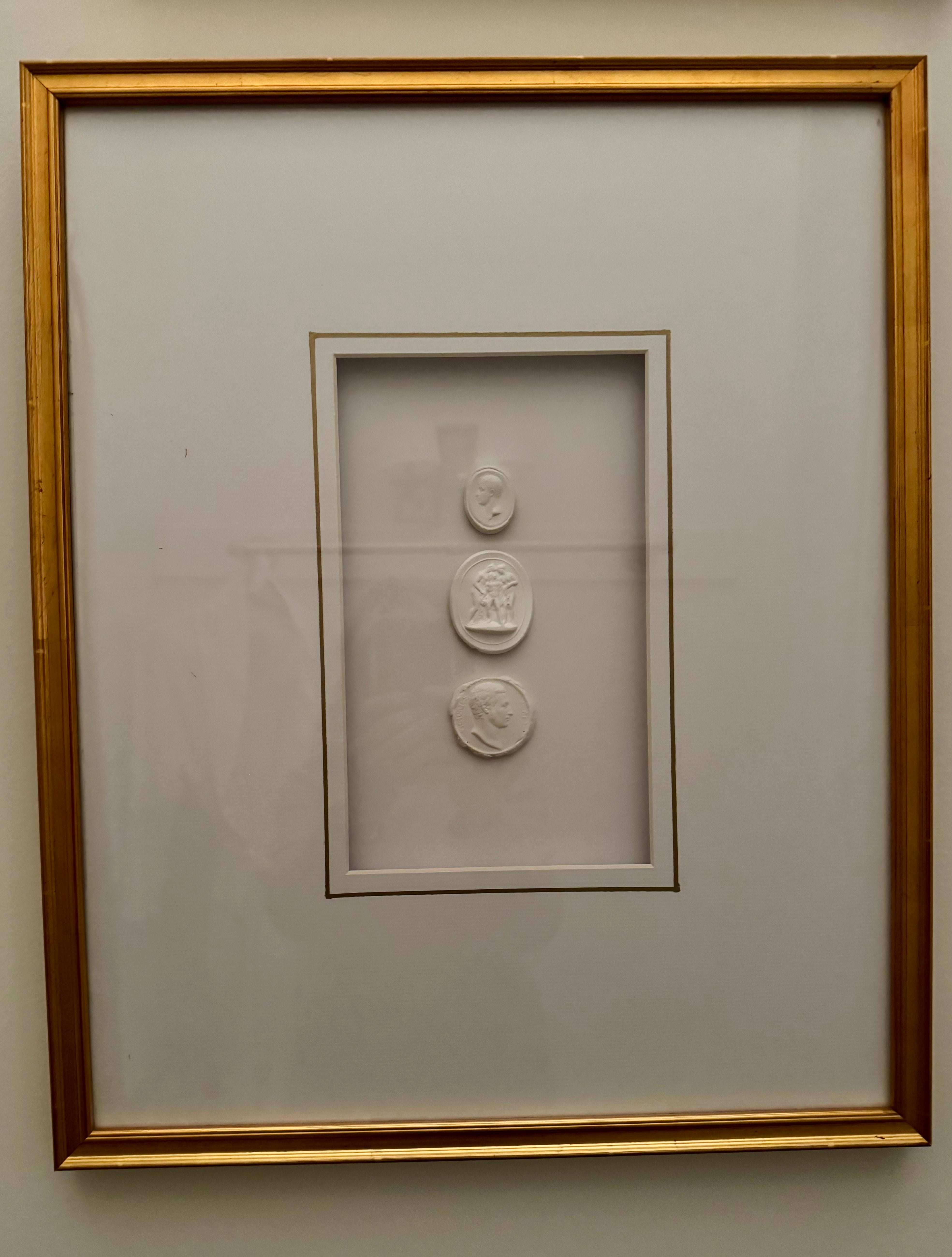 Framed Triple Intaglios