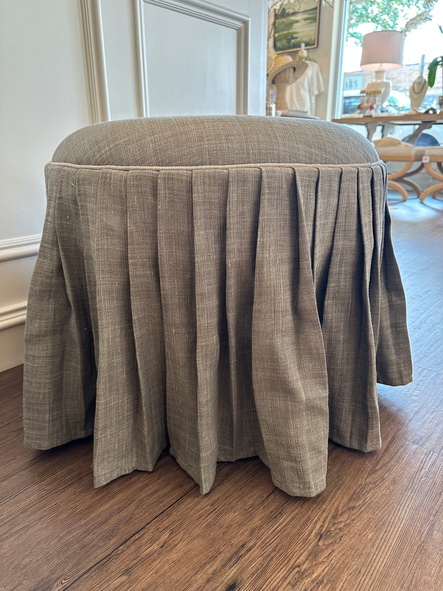 Pleated Ottoman in Gray Fabric with Silver Piping Detail