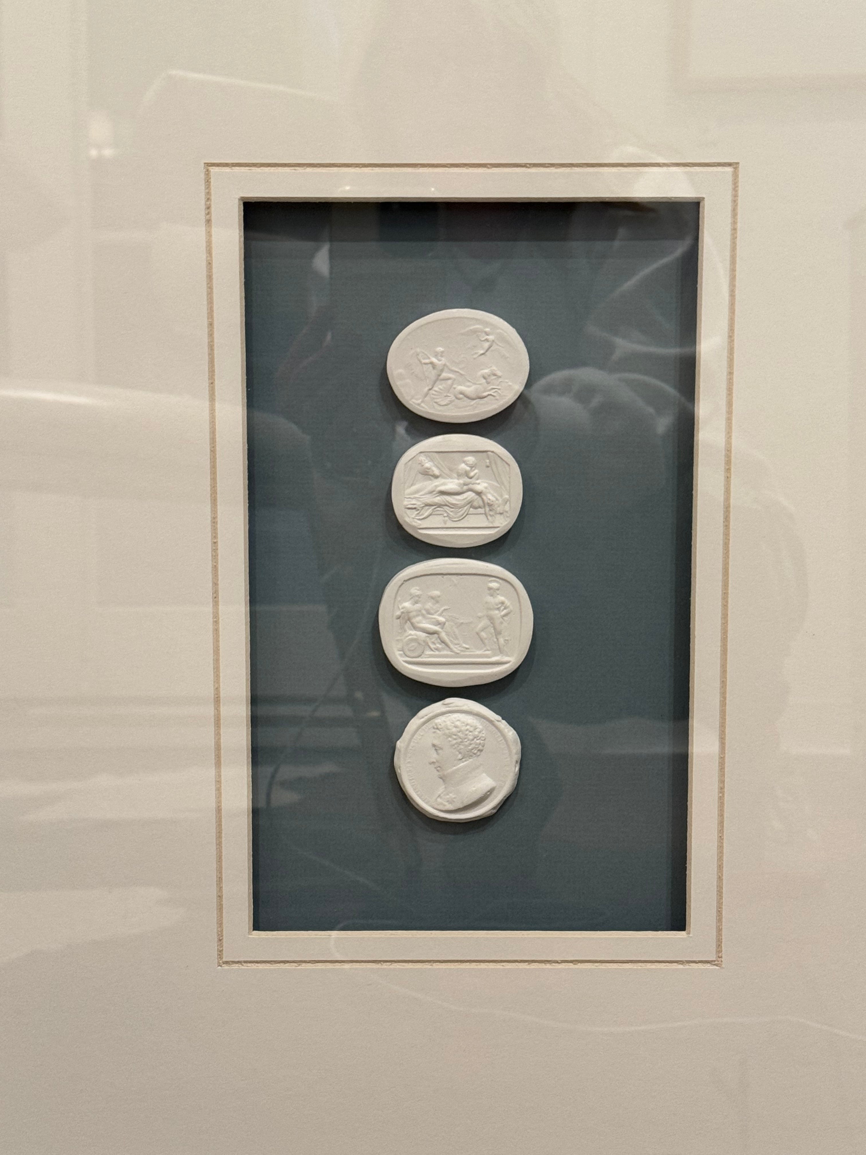 Multiple Intaglios with Blue Background