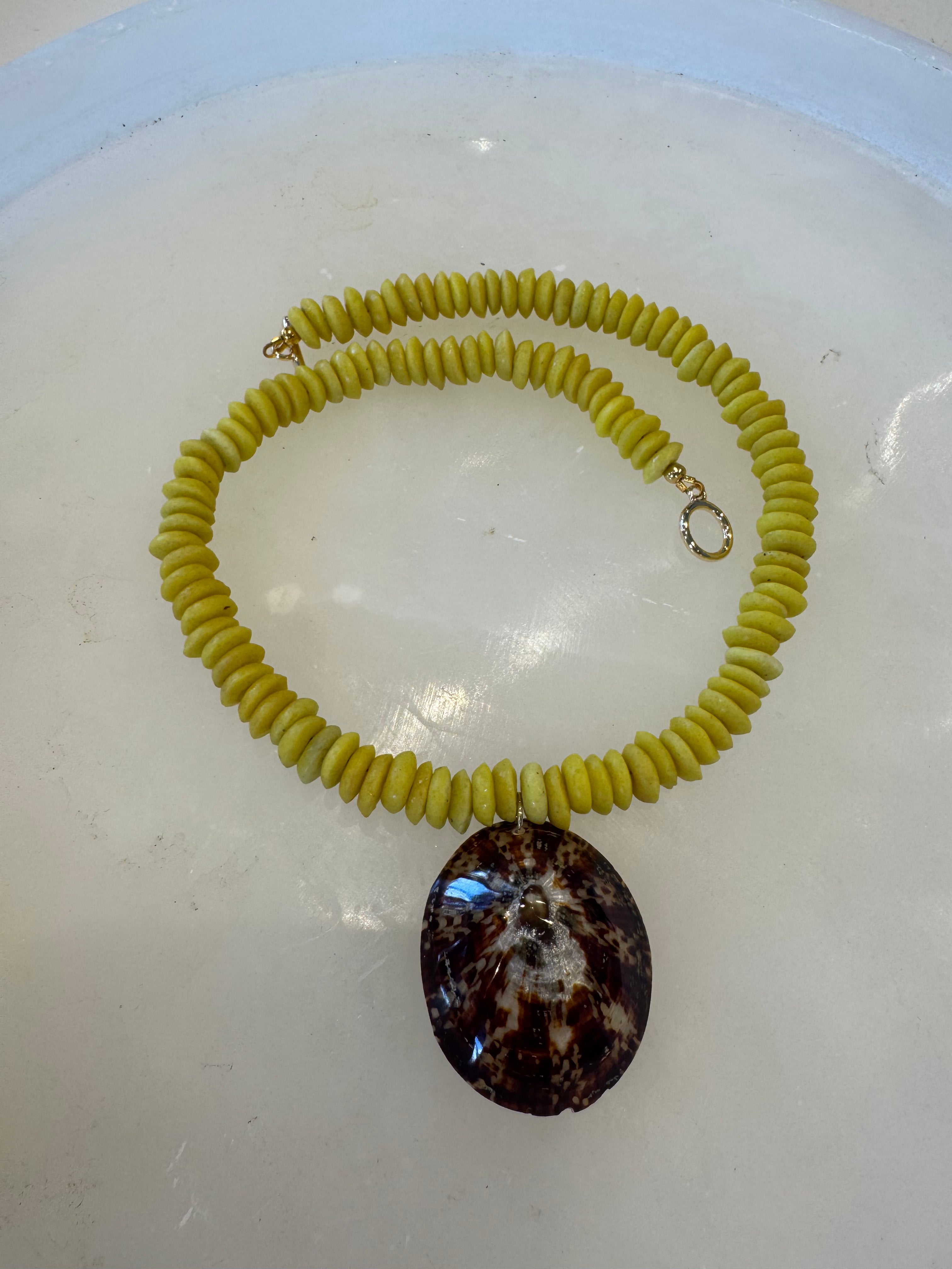 Bright Yellow Beads with Limpet Shell